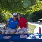 Beth Offield and Janine Wrightson preparing meal.