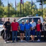 Calaveras County Sheriff's Department posing with Board and Staff from Habitat for Humanity Calaveras.