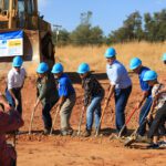 Moving dirt at groundbreaking.