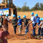 Moving dirt at groundbreaking.