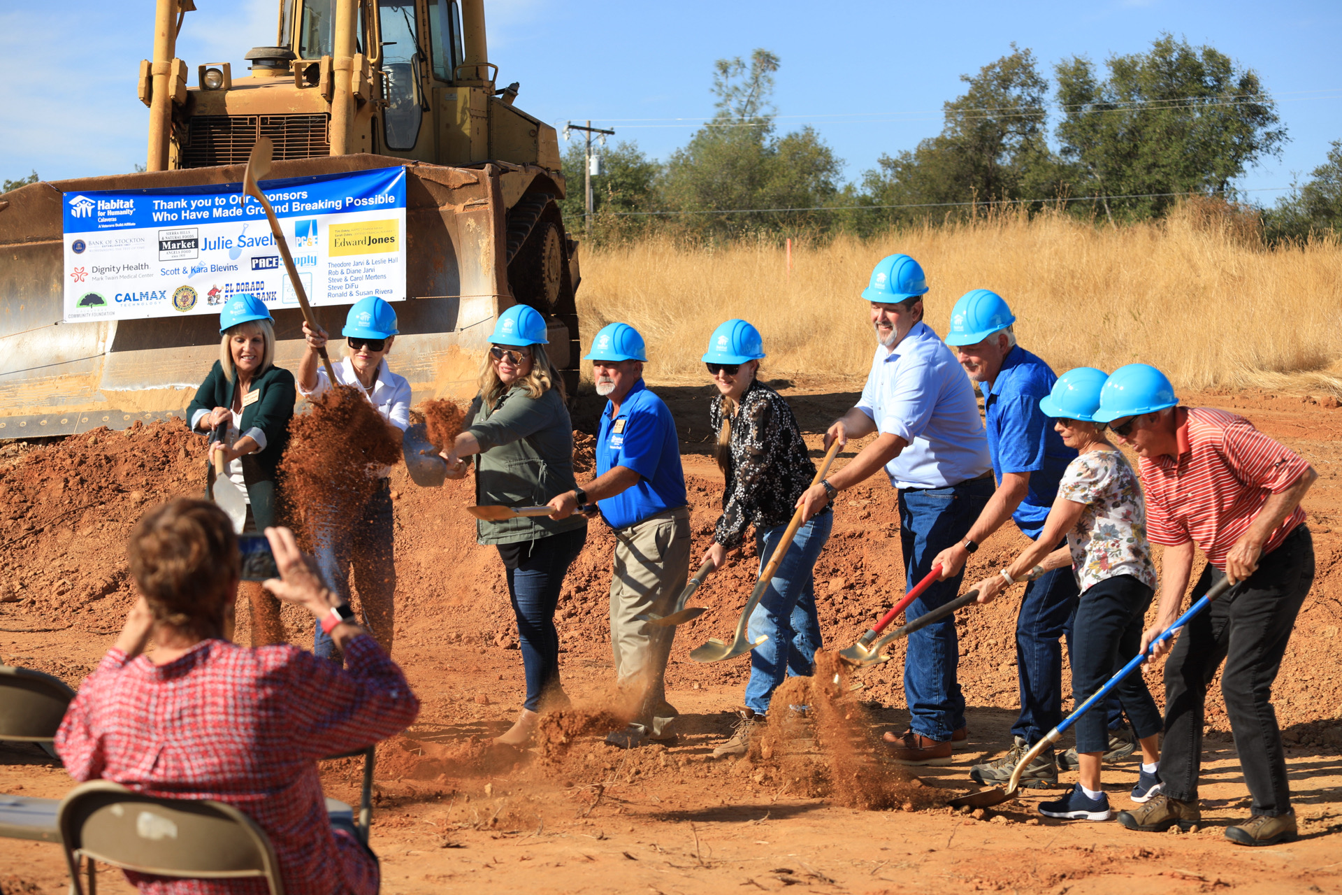 Moving dirt at groundbreaking.