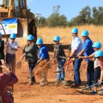 Moving dirt at groundbreaking.