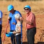 Moving dirt at groundbreaking.