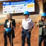 Moving dirt at groundbreaking.