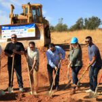 Moving dirt at groundbreaking.