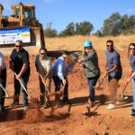 Moving dirt at groundbreaking.