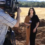 News Anchor Chloe from Fox40 news filming a segment at groundbreaking.