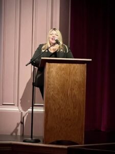Morgan Gace, Executive Director, presenting at the State of the City.
