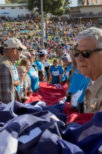 Group of Habitat Calaveras supporters getting the flag ready for the ceremony.